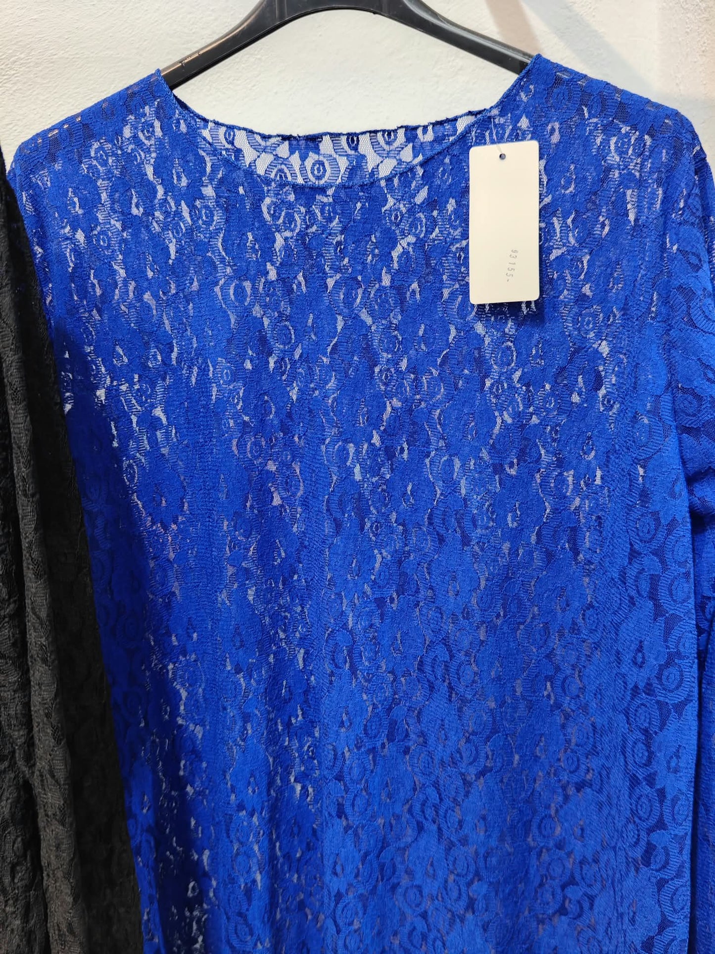 Blusa encaje asimetrica